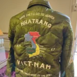 Embroidered jacket with map of Vietnam and slogan. When I die I'll go to heaven, because I have spent my time in Hell.