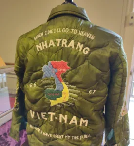 Embroidered jacket with map of Vietnam and slogan. When I die I'll go to heaven, because I have spent my time in Hell.