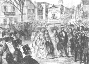 Women marching in the 1860 shoe workers strike.