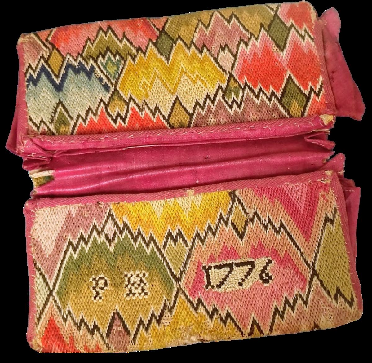 Embroided pocketbook of Peter Hay, 1776. Open case with multi-colored flame stitch needlepoint.